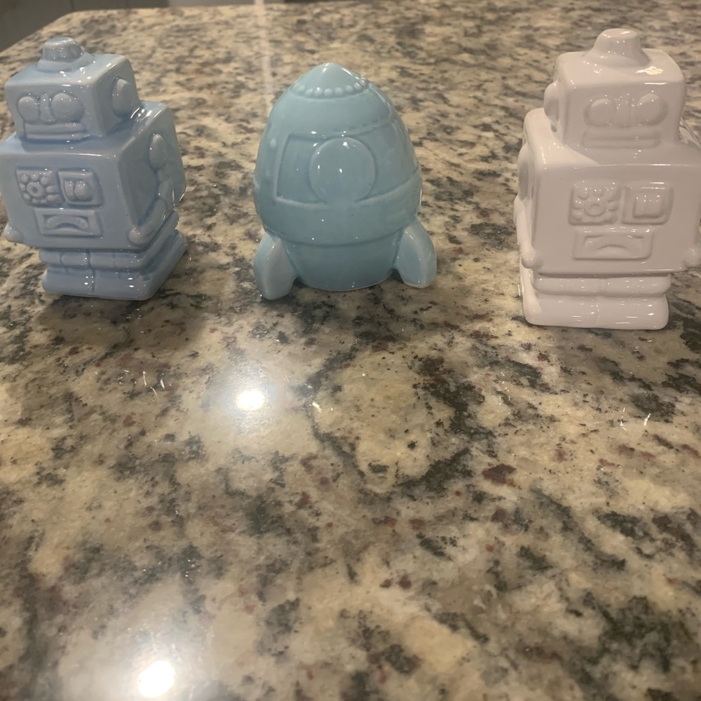 Ceramic robots with a ceramic rocket ship